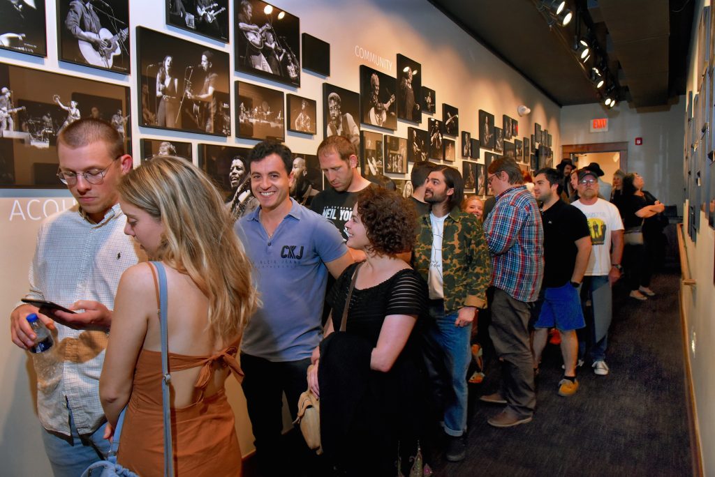 patrons lining up to enter the club